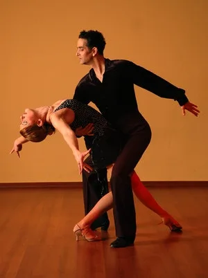 Adults learning ballroom at a dance class in Cambridge