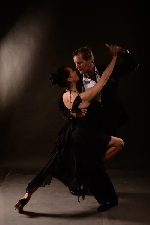 Adults learning tango at a dance class in Plymouth
